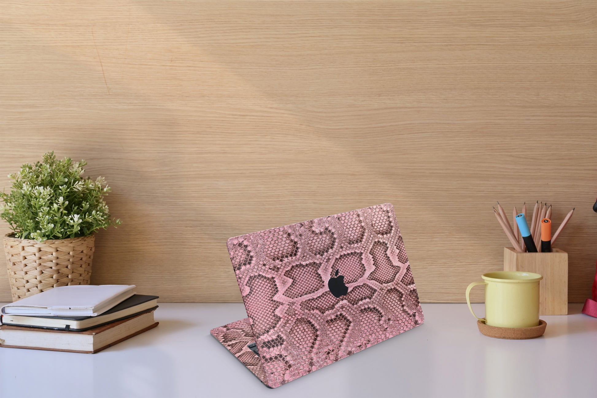 Elevate your MacBook with our Pink Cobra Floral skin decal. Embrace the bold elegance of cobra-inspired floral patterns while protecting your device. Upgrade your laptop&#39;s aesthetic with this unique design!