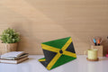 Elevate your MacBook with our Jamaican skin decals. Immerse yourself in the vibrant colors and culture of Jamaica while protecting your device. Upgrade your laptop's style with this unique design!