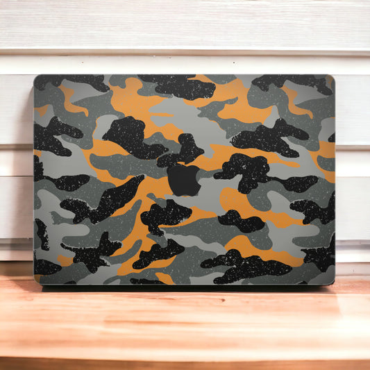 Close-up view of a Camo pattern MacBook skin sticker decal, featuring a classic camouflage design in shades of green, brown, and black