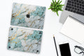 Close-up view of Marble Blue MacBook Skin Decal showcasing intricate marble patterns in shades of blue, providing a luxurious and sophisticated appearance.