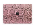 Elevate your MacBook with our Pink Cobra Floral skin decal. Embrace the bold elegance of cobra-inspired floral patterns while protecting your device. Upgrade your laptop's aesthetic with this unique design!